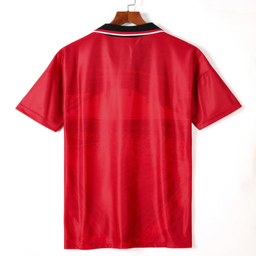 Maillot domicile rétro Manchester United 1994-1996, marque Le 12, vue d'ensemble du maillot de football rouge avec logo.