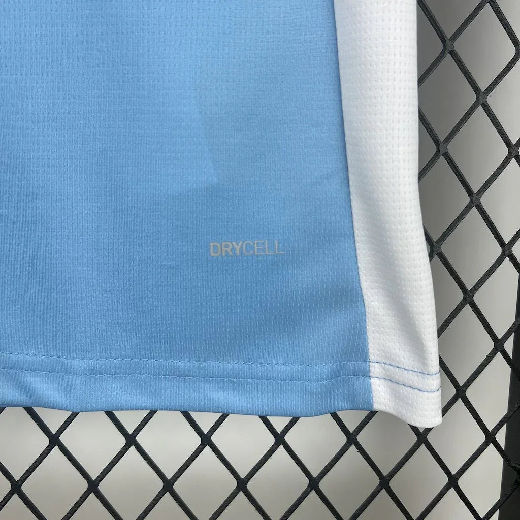 Maillot Manchester City 2025-26 Le 12 -ème Maillot, vue de face avec logo et détails du maillot de football.