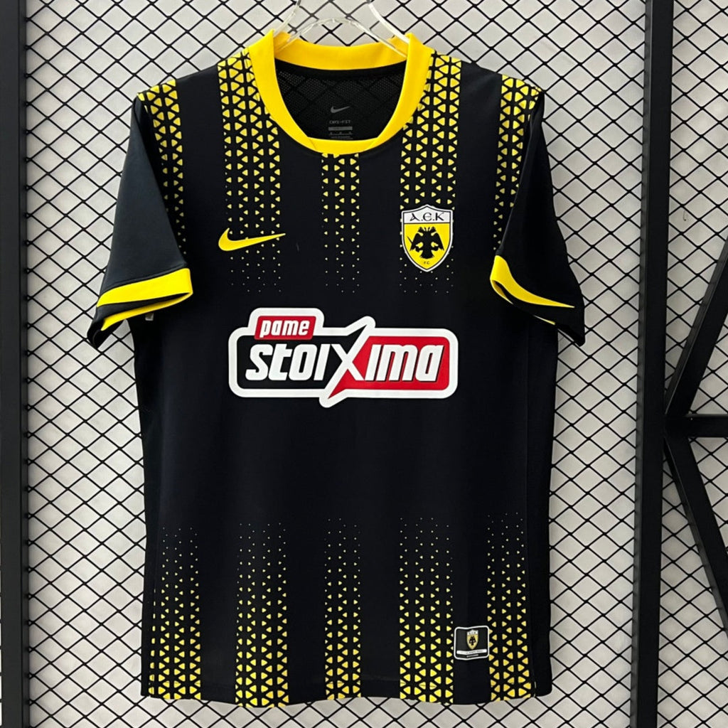 Maillot extérieur AEK Athens 25/26, marque Le 12 -ème Maillot, vue du maillot de football avec logo et détails colorés