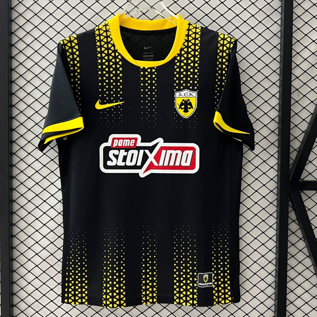 Maillot extérieur AEK Athens 25/26, marque Le 12 -ème Maillot, vue du maillot de football avec logo et détails colorés