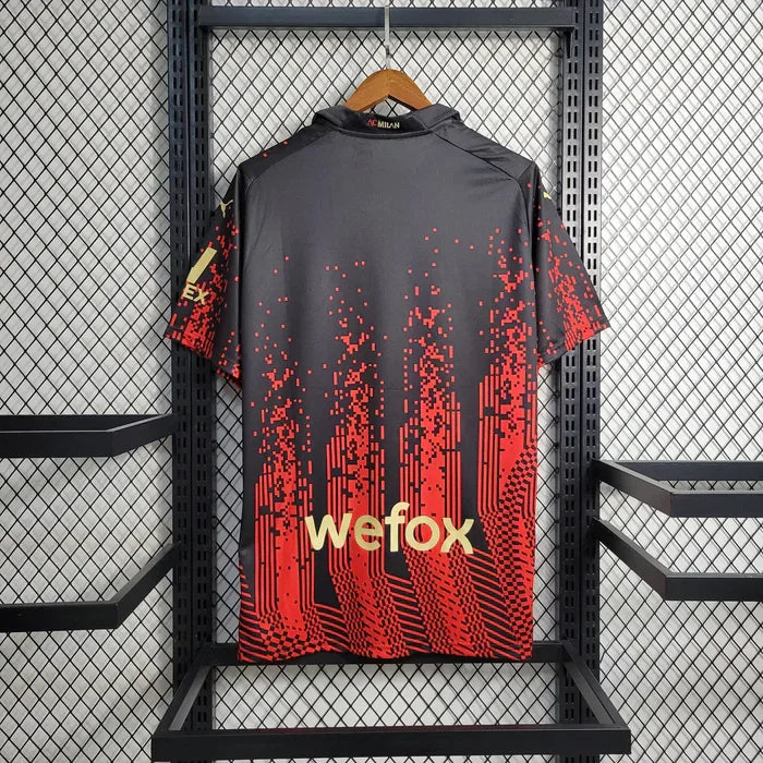 Maillot extérieur de l'AC Milan saison 2023-2024, marque Le 12 -ème Maillot, vue de face avec logo et design sportif.