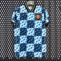 Maillot Manchester United 25/26 Le 12-ème Maillot bleu, maillot de football pour enfants, détail du logo et design spécial.