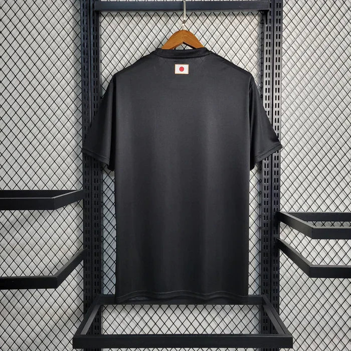 Maillot d'entraînement noir du Japon 2023-2024 de la marque Le 12 -ème Maillot, vue de face avec logo visible