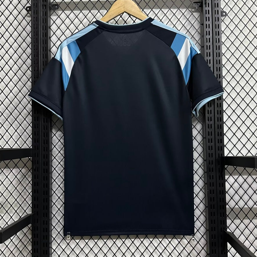 Maillot 24/25 Argentine Le 12ème Maillot, maillot de football bleu avec logo de l'équipe nationale Argentine.