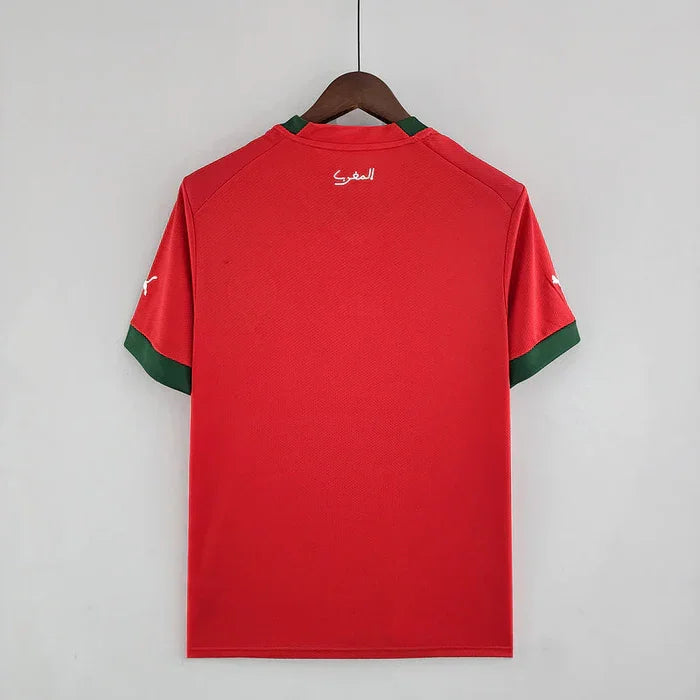 Maillot domicile du Maroc 2022-2023 par Le 12 -ème Maillot, vue de face avec logo et design rouge et vert.