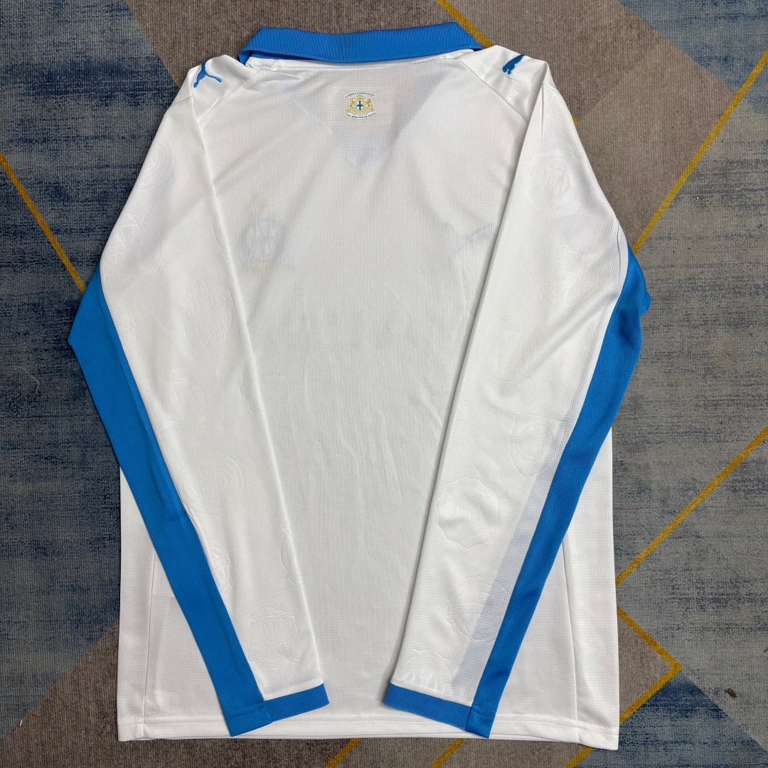 Maillot domicile Marseille 25/26 à manches longues, marque Le 12 -ème Maillot, vue frontale avec logo et détails du maillot.
