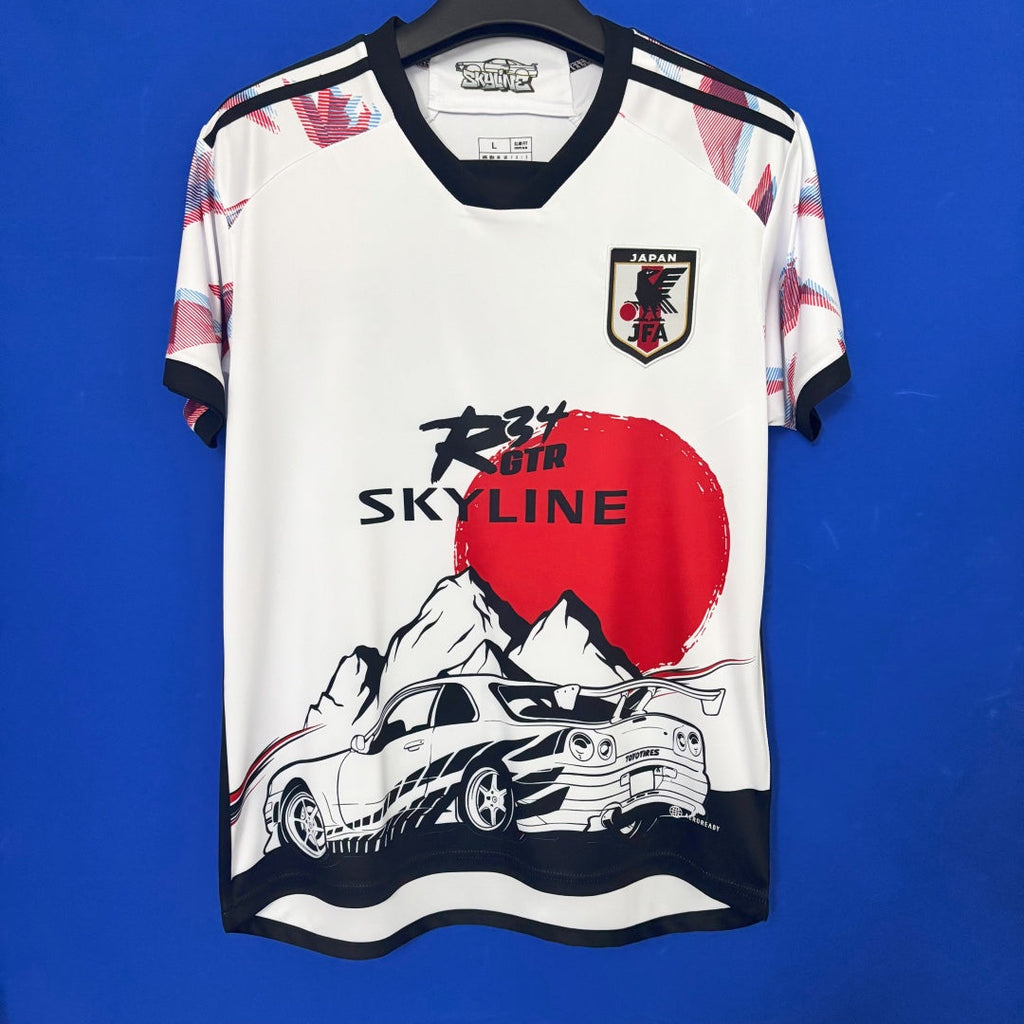 Maillot 25/26 Japon Le 12 -ème Maillot, maillot de sport avec design japonais, vue de face, couleurs vives et logo visible.