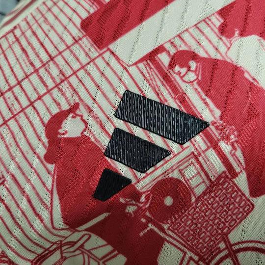 Maillot Japon saison 2023, édition spéciale, de l'équipe de football Tokyo, marque Le 12, devant avec détails du design bleu et blanc