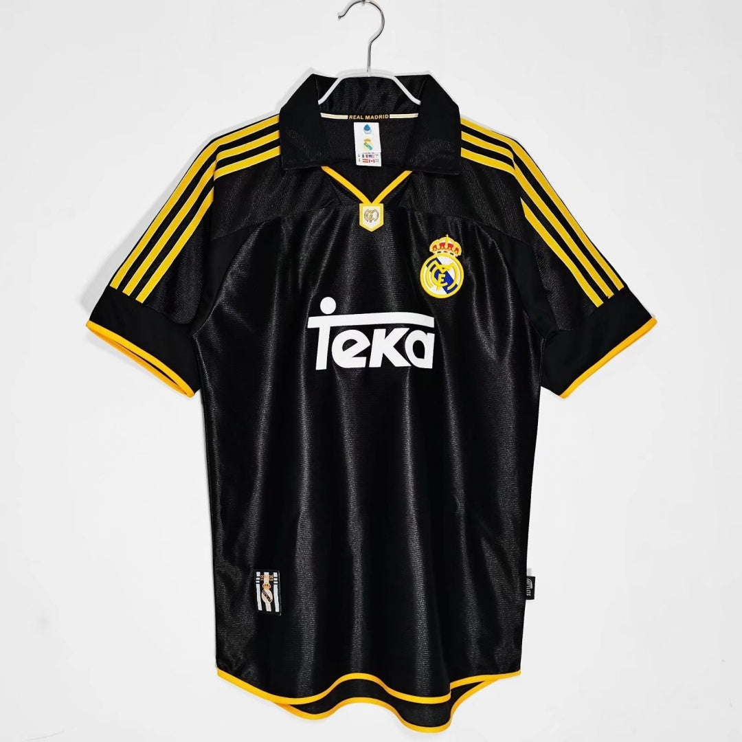 Maillot extérieur rétro Real Madrid 1999-2001, marque Le 12 -ème Maillot, vue du devant avec logo et design classique.