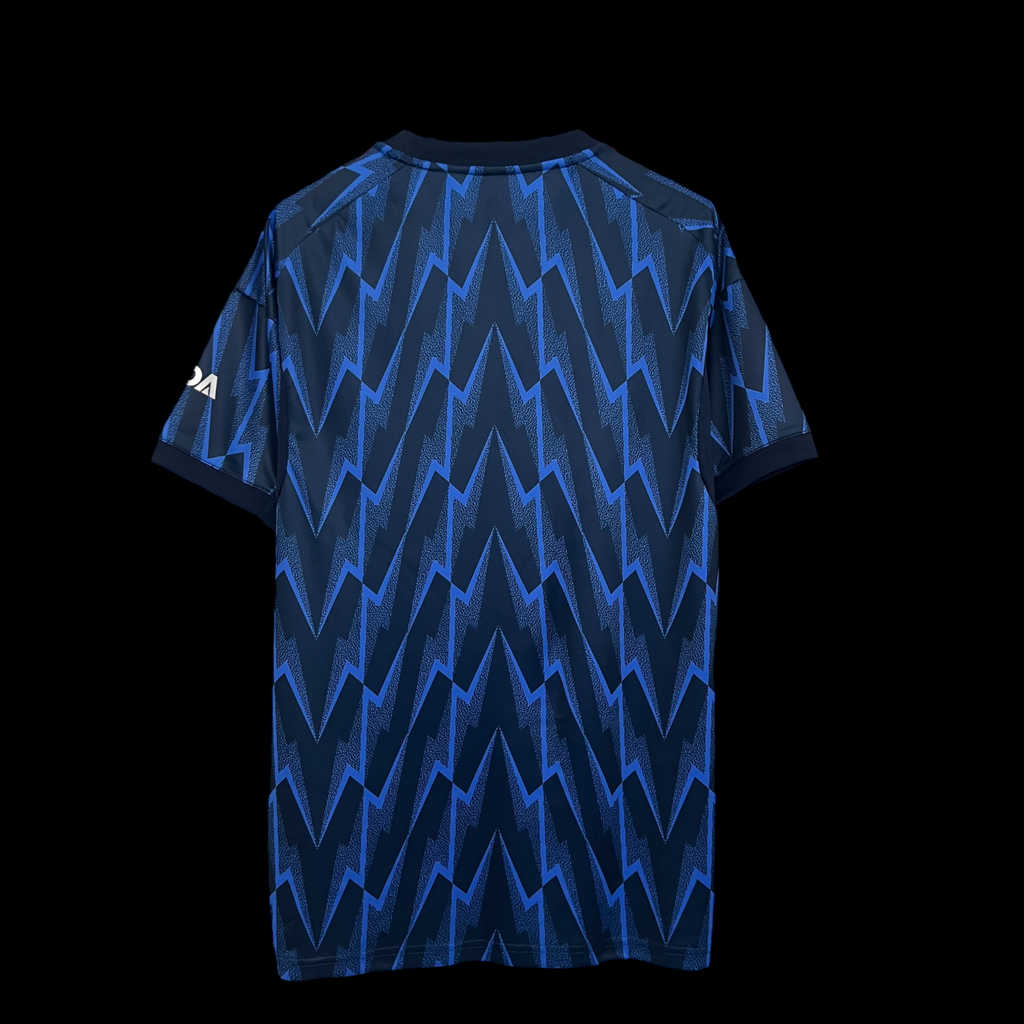 Maillot extérieur Arsenal 25/26 Le 12 -ème Maillot, en tissu avec logo et détails sportifs visibles.
