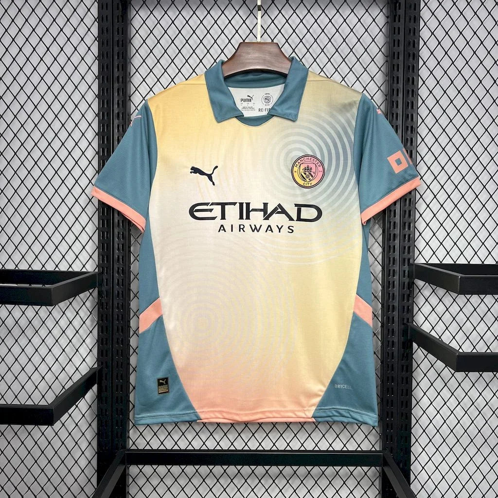 Maillot de football Manchester City 2024-2025 quatrième maillot, marque Le 12 -ème Maillot, vue de face avec logo et détails.
