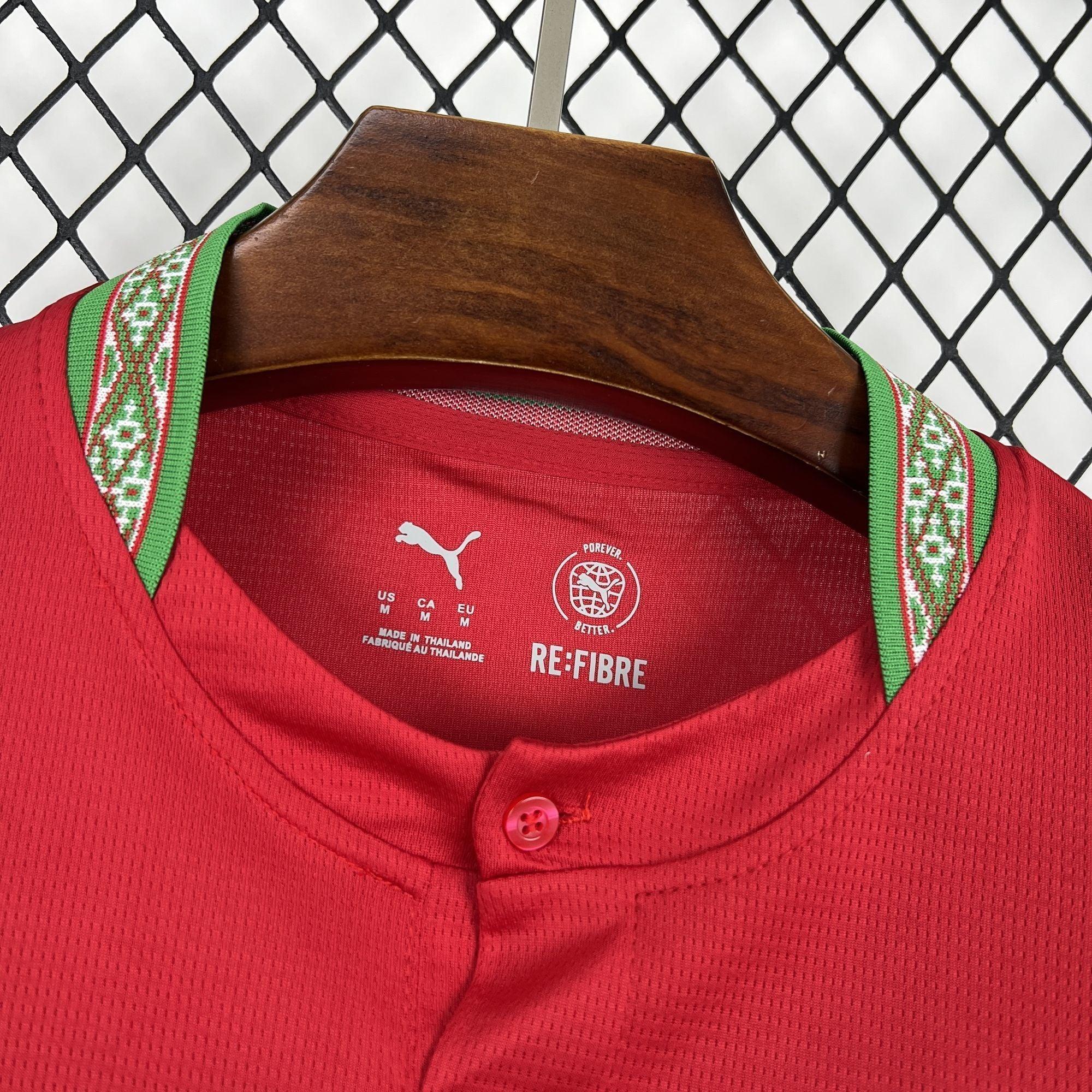 Maillot Maroc Coupe du monde 2026 Le 12 -ème Maillot, maillot de football avec drapeau marocain et logo de l'équipe nationale.