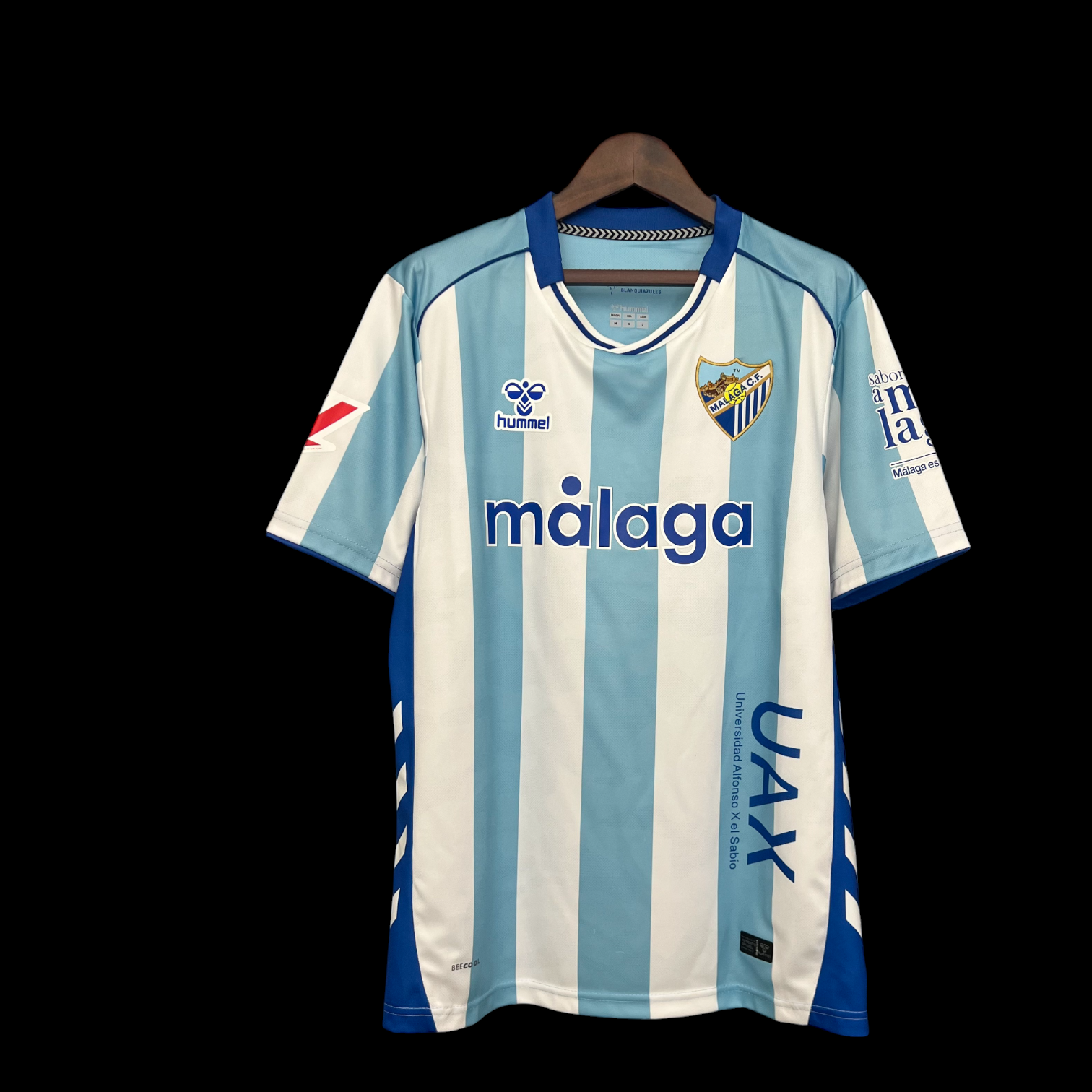 Maillot domicile Malaga 25/26 de Le 12 -ème Maillot, maillot de football rouge avec logo de l'équipe.