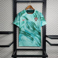 Maillot Portugal saison 2023-2024 d'entraînement Le 12 -ème Maillot, maillot de football avec logo Portugal visible sur le devant.