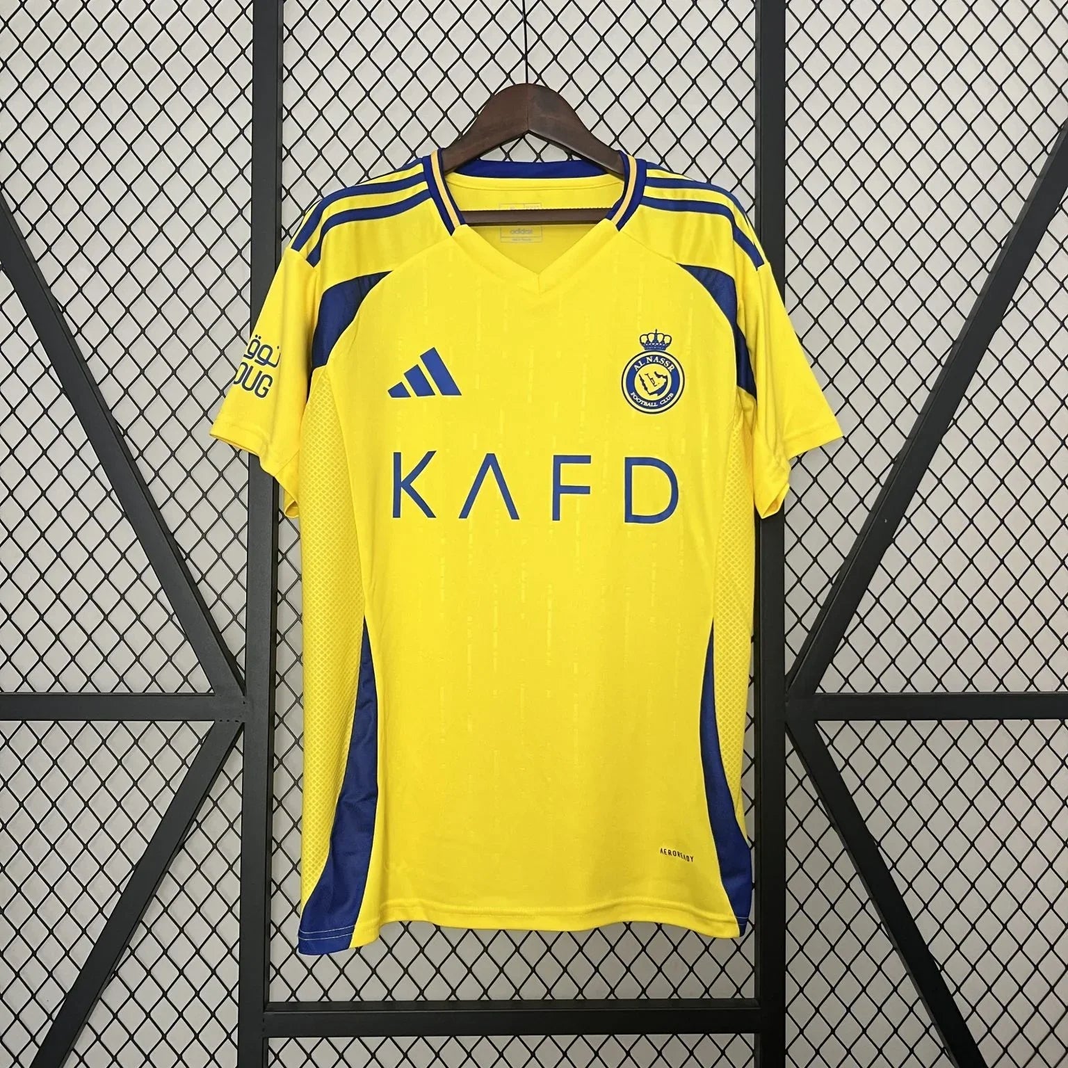 Maillot domicile AL NASSR 24/25, maillot de football Le 12 -ème, avec logo et design officiel, vue frontale.