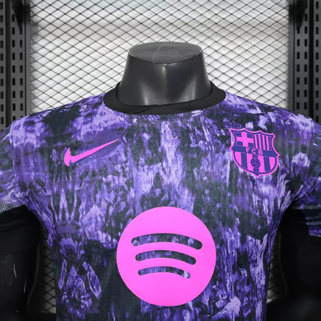 Maillot FC Barcelone 2025/26 Le 12 -ème Maillot, devant avec logo et design officiel, en tissu bleu et grenat.