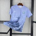 Maillot de football Brésil 2025-26, conçu par Le 12 -ème Maillot, vue de face avec logo et motifs colorés.