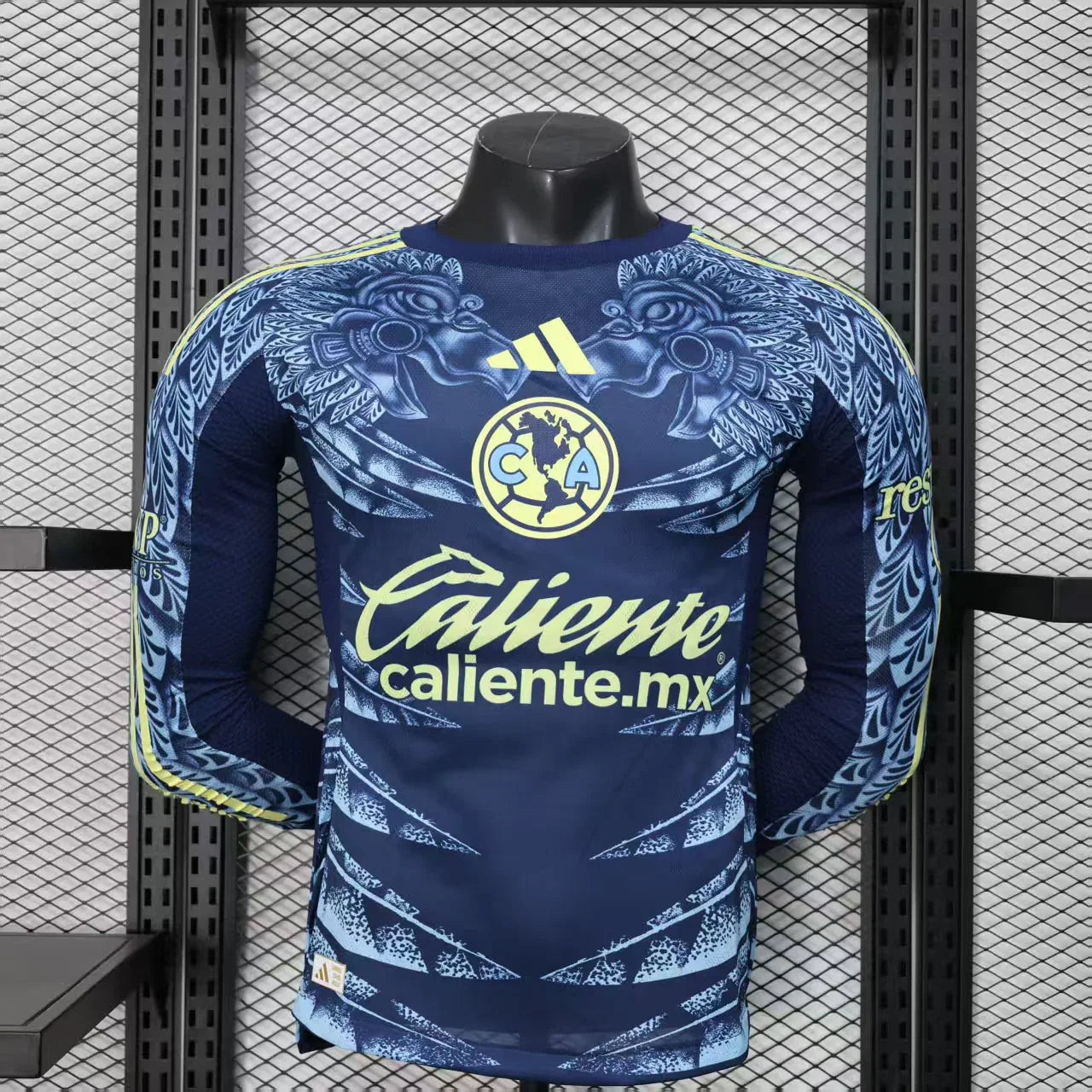 Maillot manches longues de l'équipe América 2025-26 par Le 12 -ème, avec logo et détails en bleu et blanc.