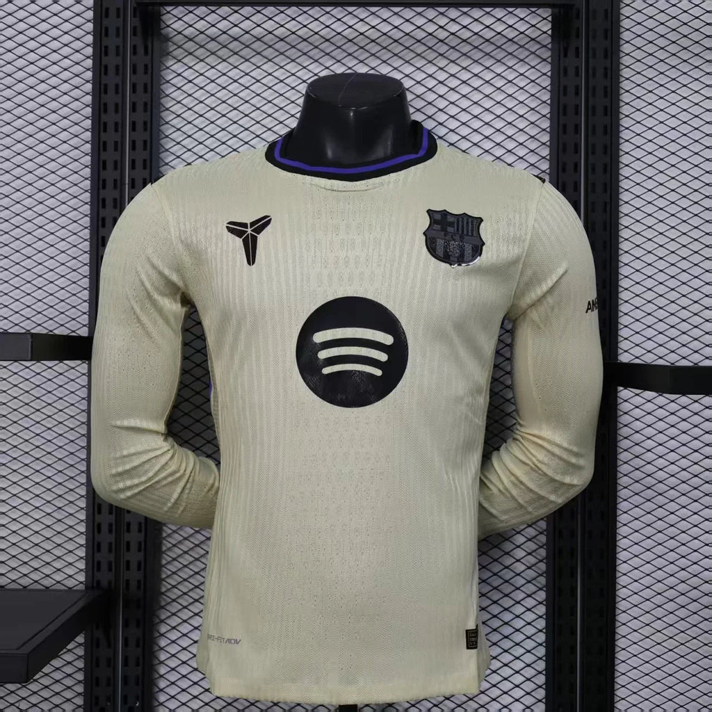 Maillot extérieur à manches longues du FC Barcelone 2025-26 par Le 12, vue frontale avec logo et design officiel.