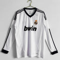 Maillot rétro domicile Real Madrid 2012-2013 à manches longues, marque Le 12 -ème Maillot, logo Real Madrid visible.