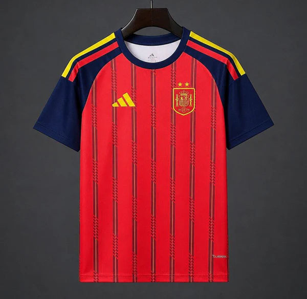 Maillot de football Espagne 2 étoiles Le 12 ème Maillot, taille 25/26, devant avec logo et design bleu et rouge.