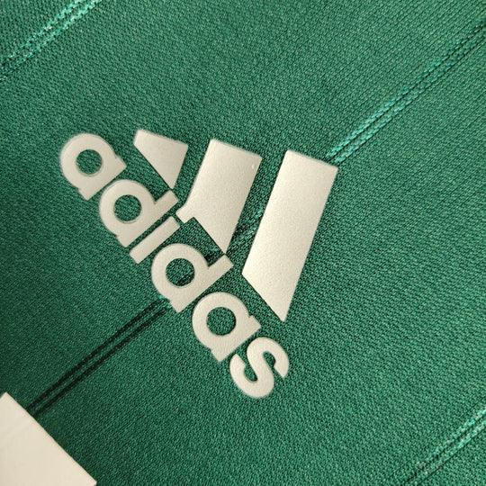 Maillot rétro Real Madrid 2012-2013, marque Le 12-ème Maillot, vue de face avec logo et détails du design vintage.