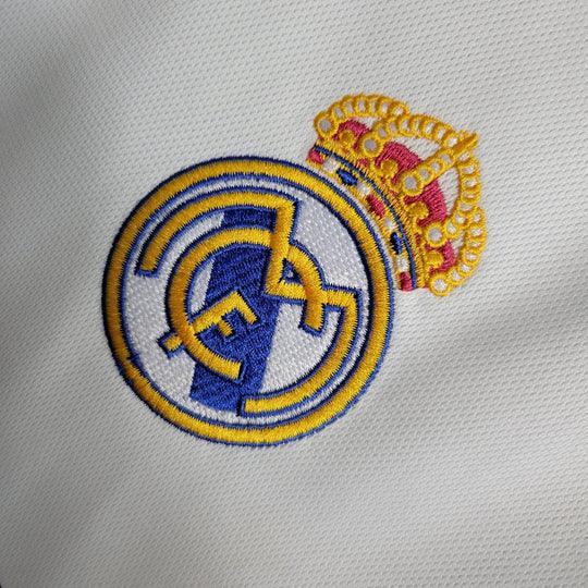 Maillot domicile Real Madrid 2023-2024, Le 12 -ème Maillot, vue de face avec logo et détails du maillot blanc.