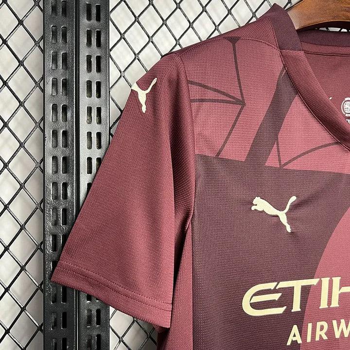 Maillot Manchester City 2024/25 Le 12 -ème Maillot, maillot de football avec logo et couleurs officielles.