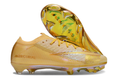 Crampons Nike Mercurial Vapor 16 Elite XXV pour football, avec semelles en métal et design innovant.