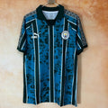 Maillot Manchester City Le 12-ème en bleu pour enfants 25/26, maillot de football officiel avec logo de l'équipe.