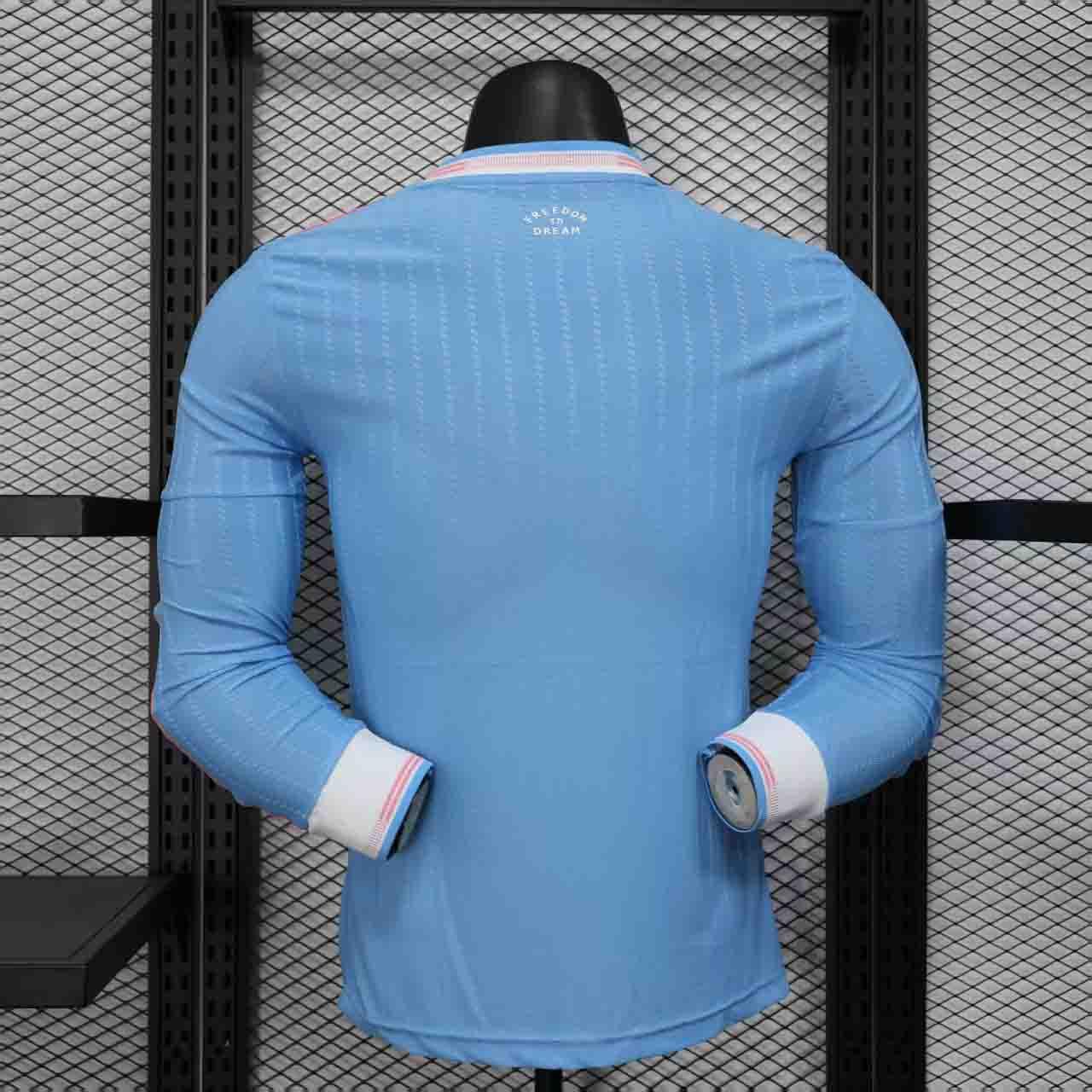 Maillot manches longues Inter Miami 2025-26 Le 12-ème Maillot, maillot de football noir et rose avec logo de l'équipe.