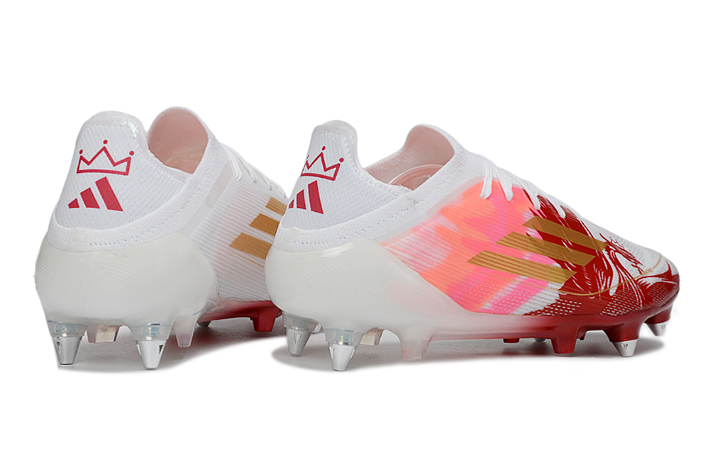 Crampons F50 FG élite de Le 12 -ème Maillot, poignées en métal avec pointes en acier pour le football sur terrain en herbe.