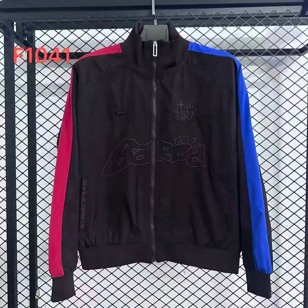 Veste coupe-vent réversible Barcelone Le 12 -ème Maillot en noir, montrant les côtés intérieur et extérieur, tissu léger et pratique.