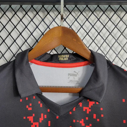 Maillot extérieur AC Milan saison 2023-2024 Le 12, maillot de football avec logo et design officiel de l'équipe.