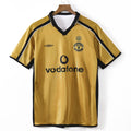 Maillot Manchester United 2001-2002, design rétro, en coton, avec logo du club et détails en rouge et blanc, par Le 12 -ème Maillot