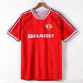 Maillot domicile rétro Manchester United 1991-1992, marque Le 12, en tissu rouge avec détails blancs, vue de face.
