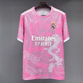 Maillot Real Madrid rose, taille 25/26, en tissu léger, portant le logo du club et le numéro 12, marque Le 12-ème Maillot.