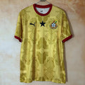 Maillot 25/26 Ghana Le 12 -ème Maillot, maillot de football jaune avec logos et détails verts, vue frontale.