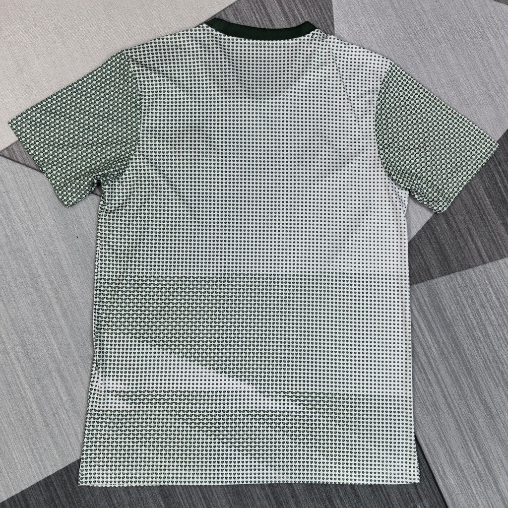 Maillot Mexique spécial 25/26 de la marque Le 12 -ème Maillot, vue de face avec détails du design orange et vert.
