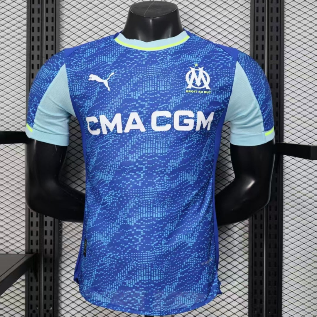 Maillot third de l'équipe Marseille 25/26 de Le 12 -ème Maillot, vue de face, avec logo et détails du maillot de football.