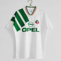 Maillot extérieur rétro de 1992-1994 pour l'équipe d’Irlande, conçu par Le 12, avec couleurs vertes et détails traditionnels.