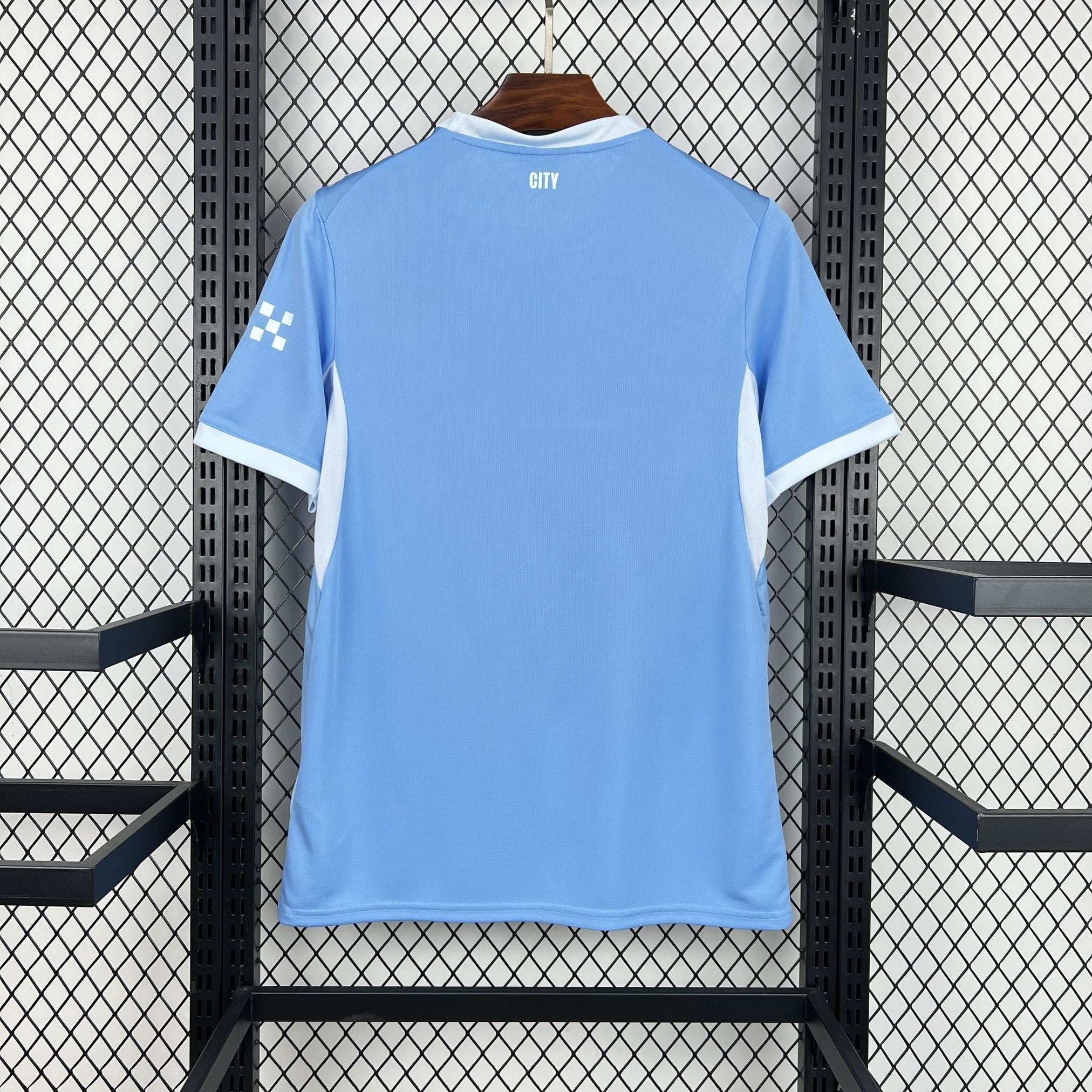 Maillot Manchester City 2026-27 Le 12 -ème Maillot, jersey de football bleu avec logo et détails du club.