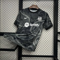 Maillot de football FC Barcelone noir concept 2024-2025, marque Le 12 -ème Maillot, vue de face avec détails du design.