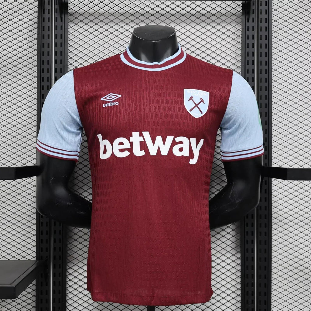 Maillot West Ham 2024-25 Le 12 -ème Maillot, maillot de football avec logo de l'équipe et détails de conception.