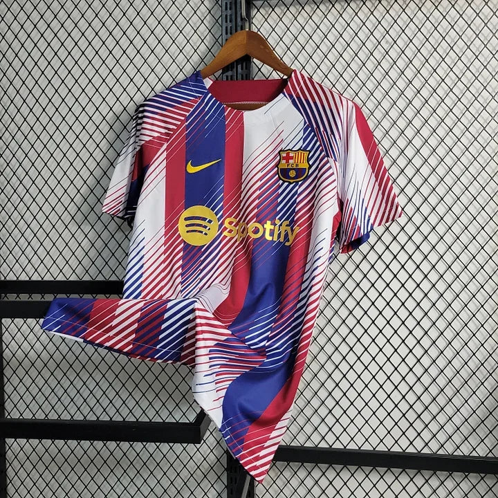 Maillot d'entraînement Barcelone FC 2023-2024 par Le 12 -ème Maillot, vue de face avec logo et design sportif.