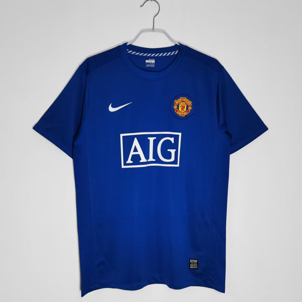 Maillot third rétro Manchester United 2007-2008, marque Le 12-ème Maillot, vue de face avec logo et détails du design.