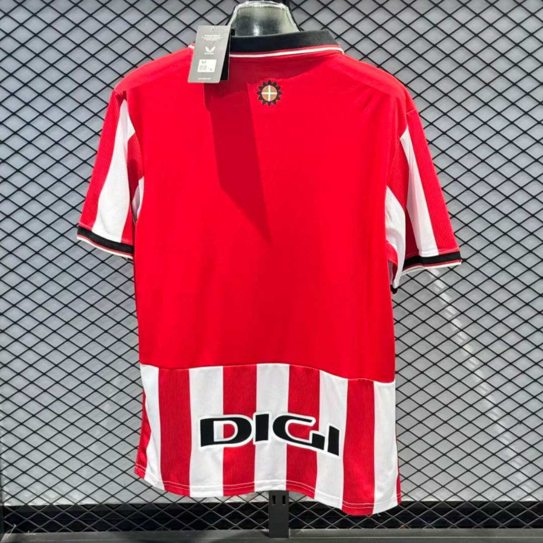 Maillot domicile Athletic Bilbao 25/26, marque Le 12 -ème Maillot, avec logo et couleurs rouges et blanches.