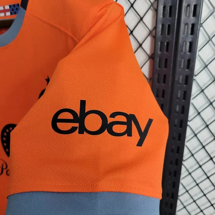 Maillot de football Inter Milan third orange 2023-2024, marque Le 12 -ème Maillot, vue du devant avec logo et détails du maillot