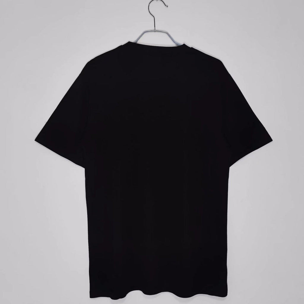 Maillot rétro 2020 du PSG noir de la marque Le 12-ème Maillot, vue de face avec logo et détails du maillot de football.