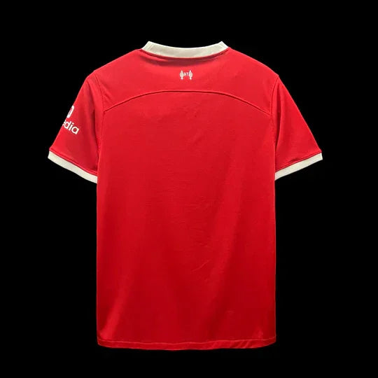 Maillot domicile Liverpool 2023 2024 Le 12 -ème Maillot, maillot de football rouge avec logo du club et détails officiels.